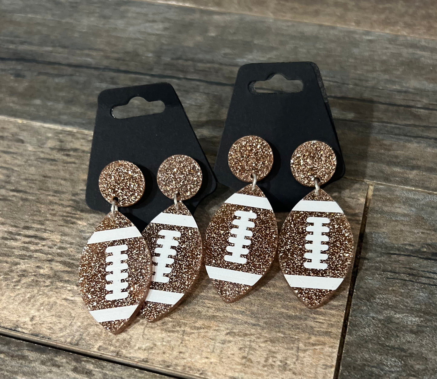 Football dangle earrings