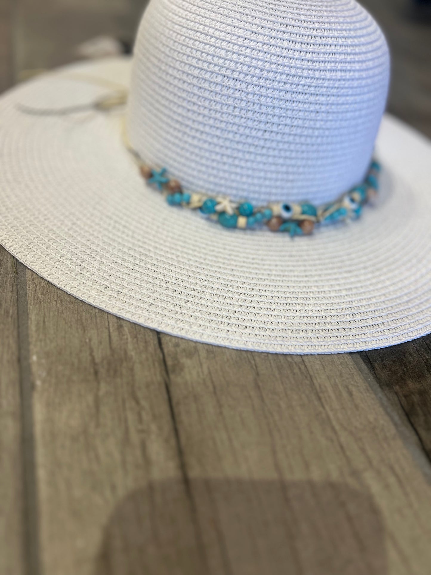 White beaded straw sun hat