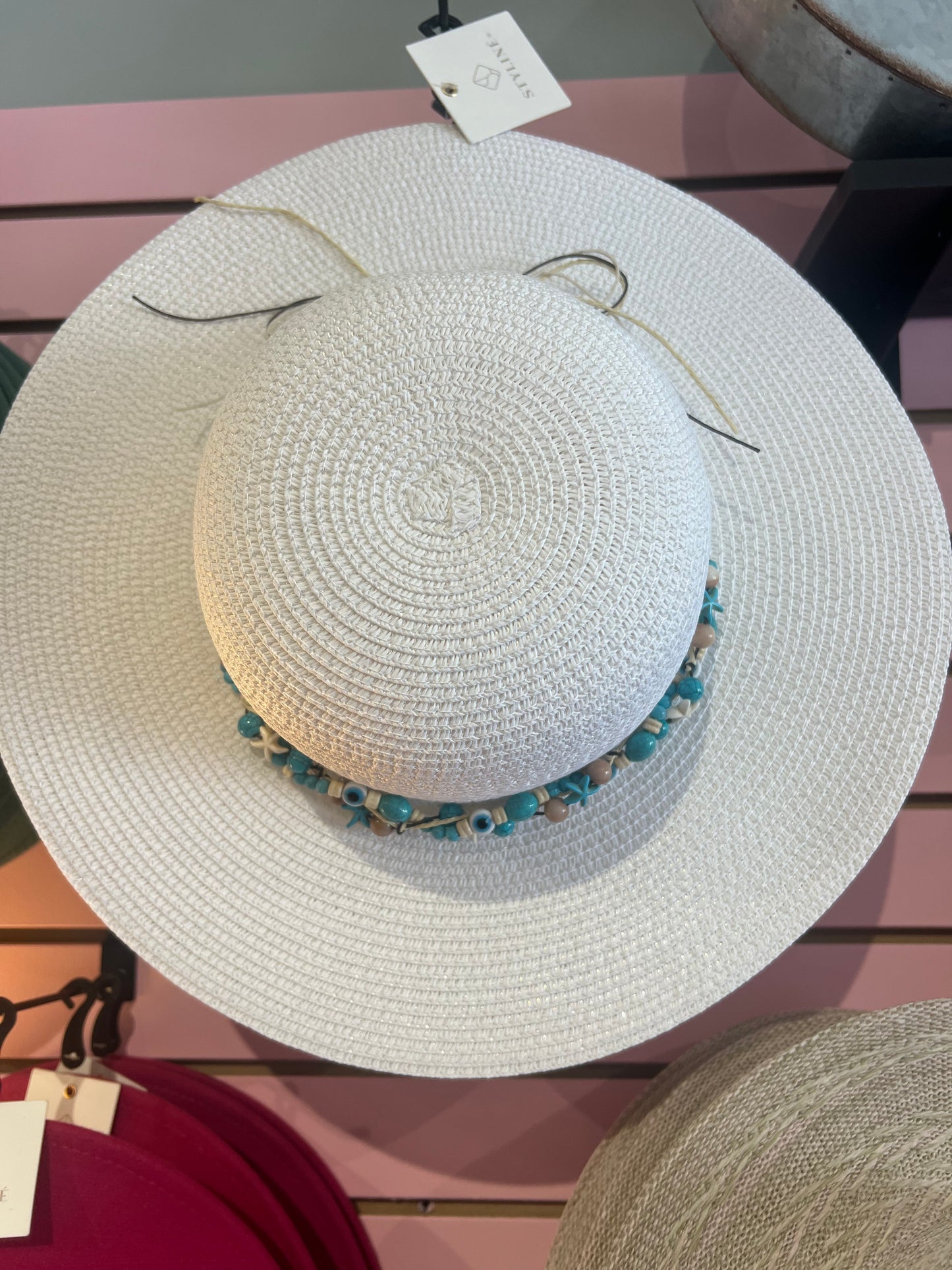 White beaded straw sun hat